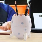 Portalápices con forma de huevo de dinosaurio recipiente de almacenamiento organizador de escritorio para esferos lapiz FK23D-222 - Imagen 5